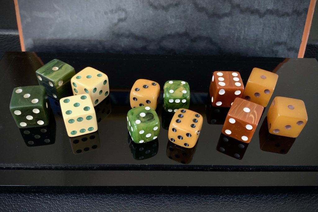 Vintage black and yellow Bakelite backgammon game pieces factory