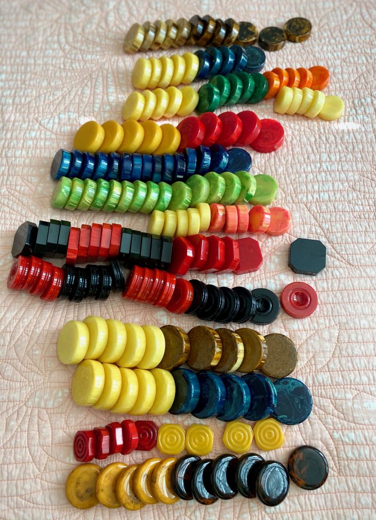 15 green and outlet yellow bakelite checker/backgammon pieces